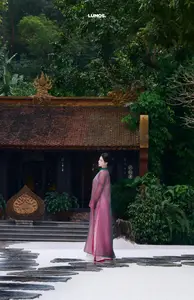 Graceful East Asian Beauty: Traditional Charm in a Lush Green Garden - image 4