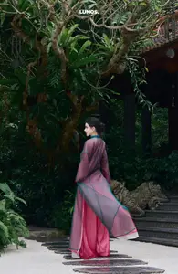 Graceful East Asian Beauty: Traditional Charm in a Lush Green Garden - image 6