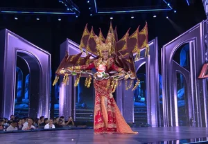 Que Anh’s Stunning Transformation: Showcasing a Massive 12kg National Costume at Miss Grand International - image 8