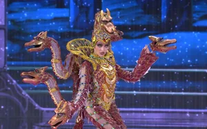 Que Anh’s Stunning Transformation: Showcasing a Massive 12kg National Costume at Miss Grand International - image 6