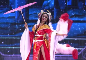 Que Anh’s Stunning Transformation: Showcasing a Massive 12kg National Costume at Miss Grand International - image 10