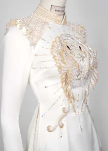 Sparkling Elegance: Runner-up Phuong Nhi Shines in Swarovski-Encrusted Ao Dai for Her Engagement Ceremony - image 2