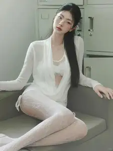 Elegant Beauty: Captivating Model Showcases Minimalist Fashion with Striking Unique Makeup and Alluring Style - image 5