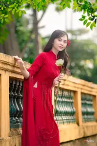 VGU No.188: Captivating Elegance: Vietnamese Beauty in Red Áo Dài with Sacred Lotus Flower. - image 4