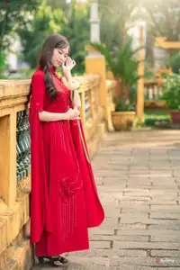 VGU No.188: Captivating Elegance: Vietnamese Beauty in Red Áo Dài with Sacred Lotus Flower. - image 0