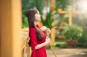 VGU No.188: Captivating Elegance: Vietnamese Beauty in Red Áo Dài with Sacred Lotus Flower. - image 5