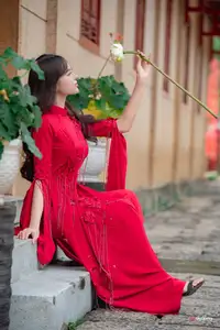 VGU No.188: Captivating Elegance: Vietnamese Beauty in Red Áo Dài with Sacred Lotus Flower. - image 6