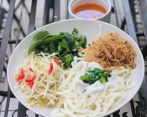 Banh Tam Bi: Mekong Delta's Rustic Dish That Hooks Diners From the First Bite - image 6