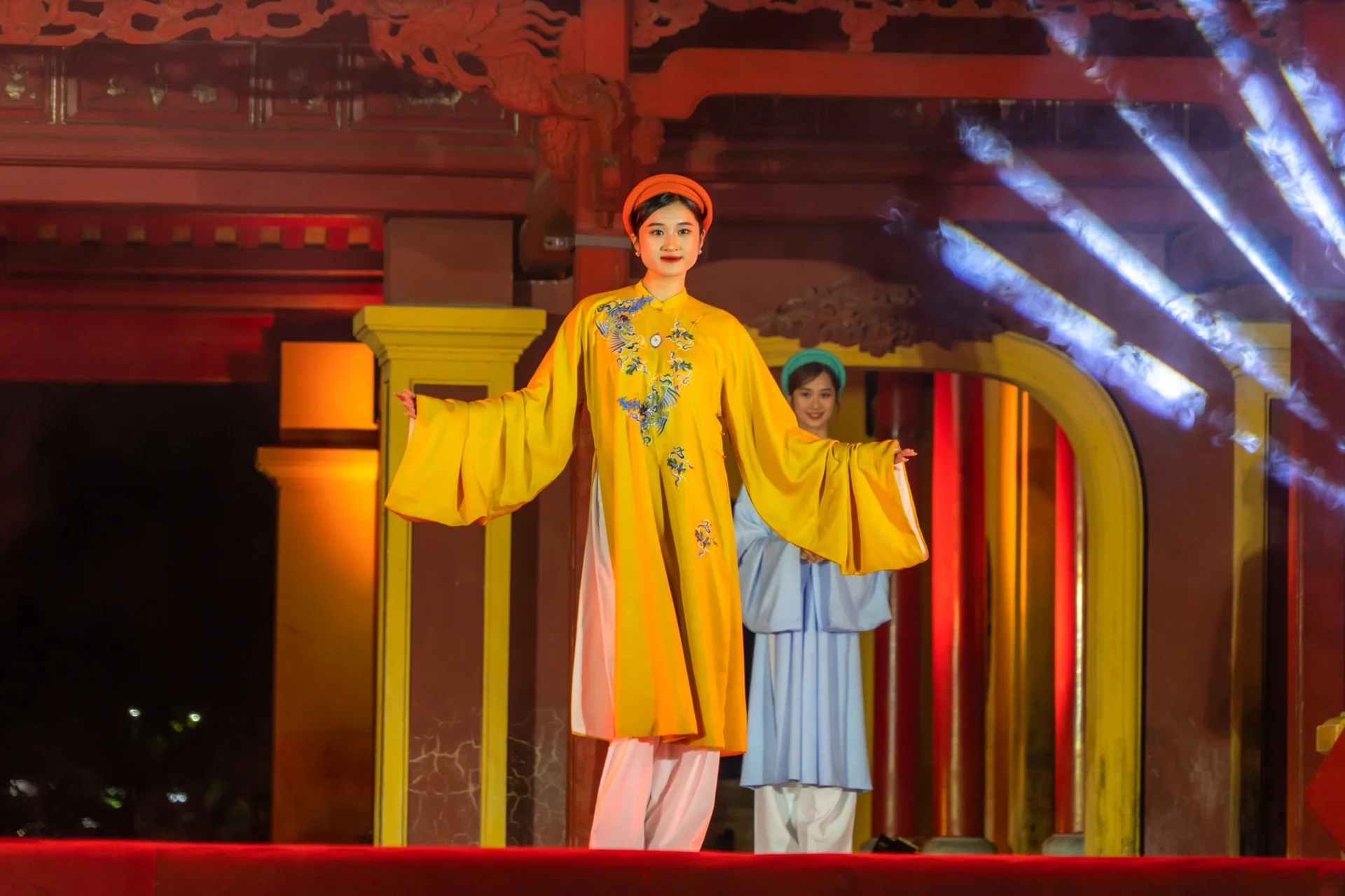 Elegant Ao Dai Collections Representing Hanoi, Hue, and Saigon Shine by the Huong River