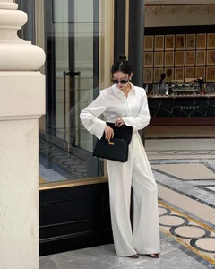 4 Elegant Ways for Women Over 40 to Style Trousers for a Sophisticated Look - image 2
