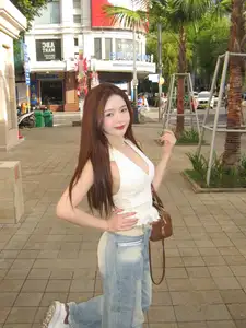 Vibrant Street Style: Young Woman Radiates Energy in Urban Chic Outfit - image 7