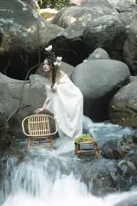 Serene Asian Beauty: A Delicate Moment with a White Flower - image 5