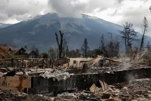 Devastating Wildfires Impact Famous Tourist Towns: A Global Concern - image 13