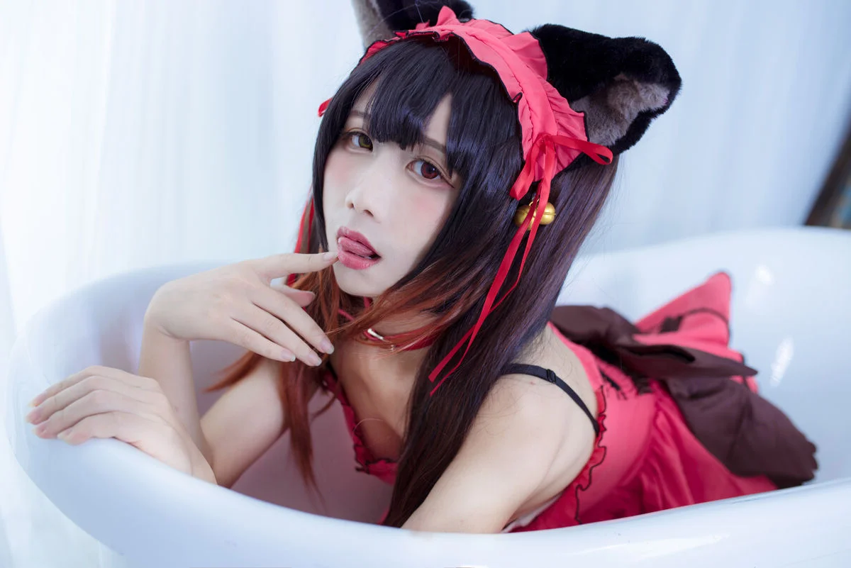 The Enchanting Charm of JiuQuJean as Neko Kurumi in Vibrant Red
