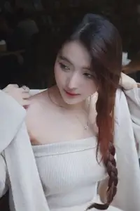 Discover the elegant charm of a gentle woman captured in a serene, thoughtful moment 176403855 - image 7