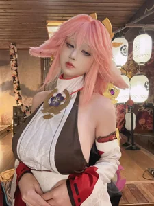 Enchanting Yae Miko Cosplay by Jiu Qu Jean - image 1