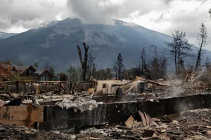 Devastating Wildfires Ravage Famous Tourist Town: A Visual Report on the Environmental Impact - image 1