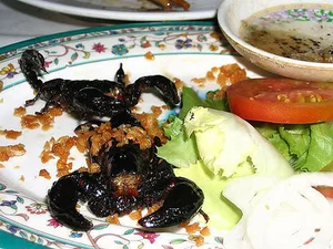 Dare to Taste: Exploring the Intimidating World of Fried Scorpion Delicacies and Exotic Street Food - image 0
