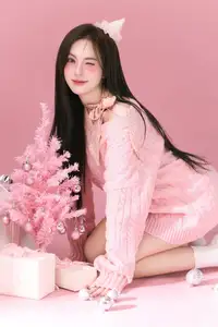 Charming Girl in Pink Sweater Embraces Cozy Christmas Style: Festive Fashion Elegance - image 4