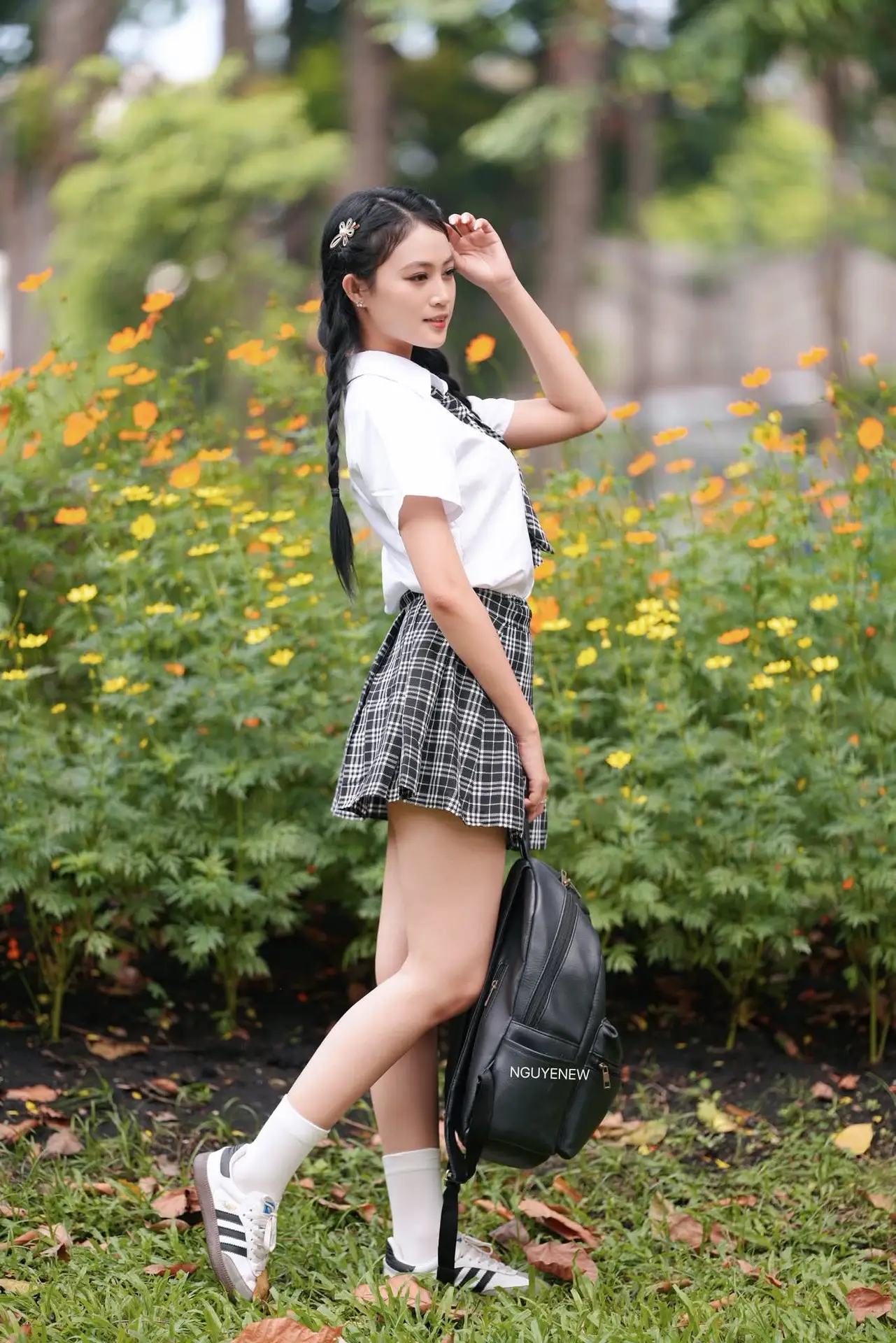 Gentle Schoolgirl's Innocent Beauty: Captivating School Style Amidst Vibrant Flowers