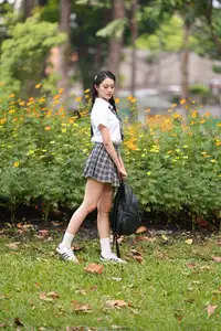 Gentle Schoolgirl's Innocent Beauty: Captivating School Style Amidst Vibrant Flowers - image 8