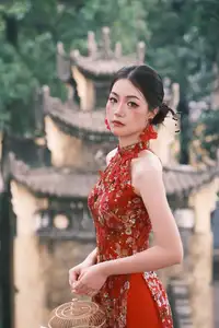 Graceful Asian Woman in Vibrant Red Floral Dress: Timeless Elegance by the Ancient Tree 1000024556 - image 2