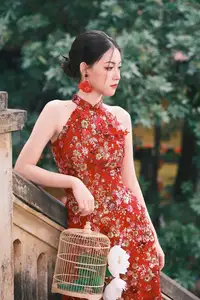 Graceful Asian Woman in Vibrant Red Floral Dress: Timeless Elegance by the Ancient Tree 1000024556 - image 1
