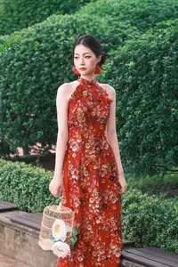 Graceful Asian Woman in Vibrant Red Floral Dress: Timeless Elegance by the Ancient Tree 1000024556 - image 4
