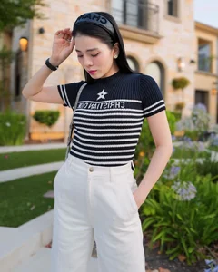 Elegant Resort Fashion Inspiration: Exploring Lệ Quyên’s Luxurious Vacation Wardrobe and Style - image 1