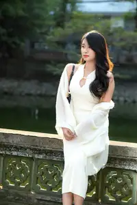 Elegant Beauty in Pristine White Dress Under Golden Afternoon Sun 1000027006 - image 4