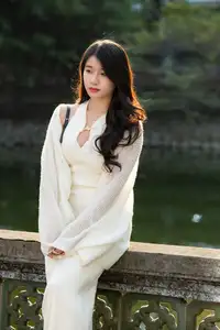 Elegant Beauty in Pristine White Dress Under Golden Afternoon Sun 1000027006 - image 3