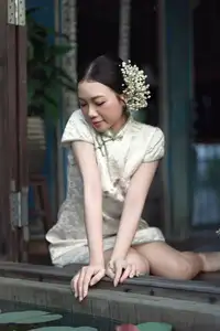 Timeless Grace: Vietnamese Woman in Modernized Ao Dai by a Serene Lotus Pond - image 19