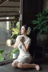 Timeless Grace: Vietnamese Woman in Modernized Ao Dai by a Serene Lotus Pond - image 7