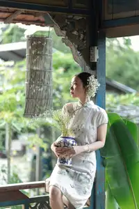 Timeless Grace: Vietnamese Woman in Modernized Ao Dai by a Serene Lotus Pond - image 4