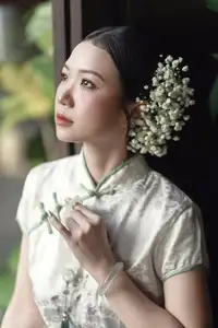 Timeless Grace: Vietnamese Woman in Modernized Ao Dai by a Serene Lotus Pond - image 5