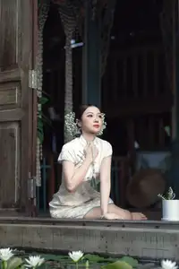 Timeless Grace: Vietnamese Woman in Modernized Ao Dai by a Serene Lotus Pond - image 2