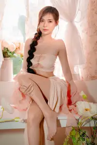 Ethereal Beauty: A Young Woman's Delicate Charm in a Flowing Pink Dress - image 18