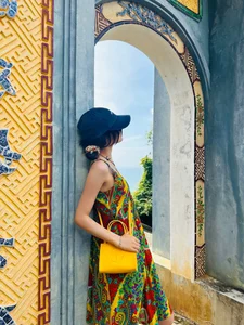 Danielle of NewJeans Shines in Hoi An: Stunning Travel Photos and Iconic Conical Hat Moments - image 1