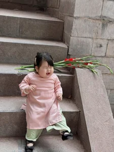 Adorable Toddler in Traditional Ao Dai Captures Hearts with Viral Photoshoot - image 3
