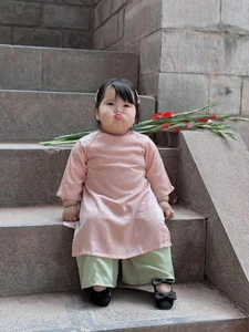 Adorable Toddler in Traditional Ao Dai Captures Hearts with Viral Photoshoot - image 0