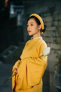 Discover the Graceful Beauty of a Vietnamese Woman in Radiant Yellow Ao Dai with Pure Lotus 1000025235 - image 3