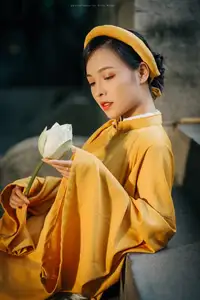 Discover the Graceful Beauty of a Vietnamese Woman in Radiant Yellow Ao Dai with Pure Lotus 1000025235 - image 7