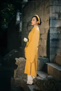 Discover the Graceful Beauty of a Vietnamese Woman in Radiant Yellow Ao Dai with Pure Lotus 1000025235 - image 2