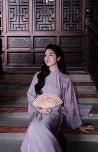 Ethereal Grace in Lavender Ao Dai Amidst Ancient Architecture - image 2