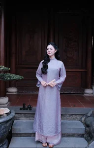Ethereal Grace in Lavender Ao Dai Amidst Ancient Architecture - image 6