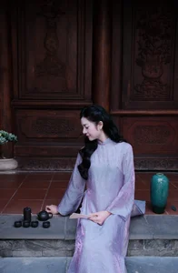 Ethereal Grace in Lavender Ao Dai Amidst Ancient Architecture - image 5