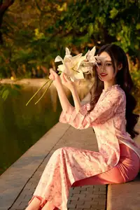 Gentle Vietnamese Beauty: Pink Ao Dai by the Lake, with Pure Lilies - image 7