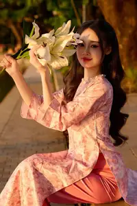 Gentle Vietnamese Beauty: Pink Ao Dai by the Lake, with Pure Lilies - image 4