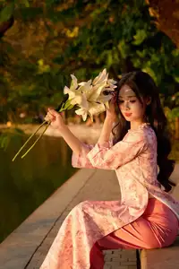 Gentle Vietnamese Beauty: Pink Ao Dai by the Lake, with Pure Lilies - image 13