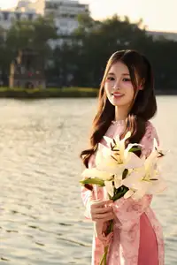 Gentle Vietnamese Beauty: Pink Ao Dai by the Lake, with Pure Lilies - image 11